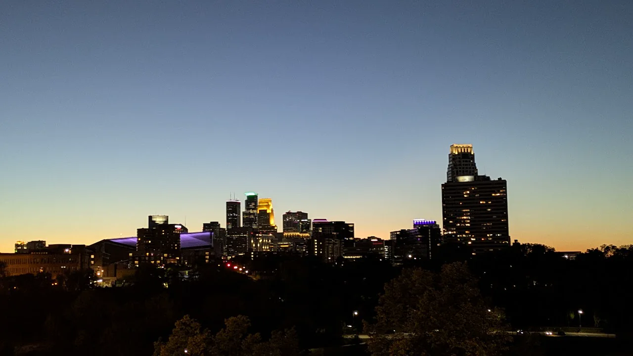 Minneapolis skyline illuminated at dusk